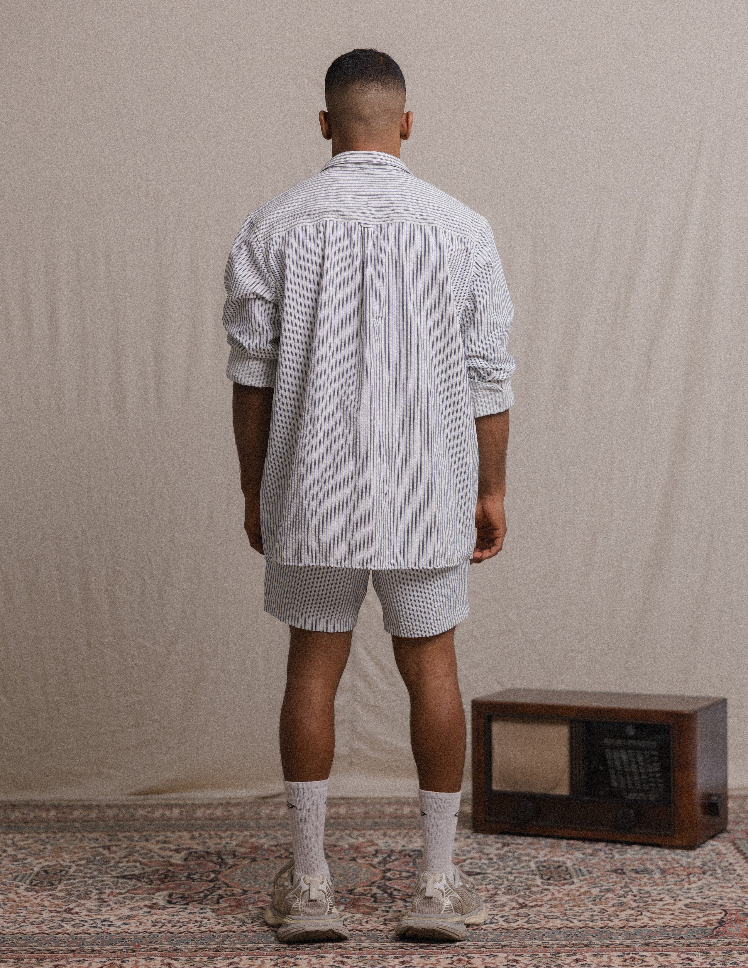 Center back pleat loop detail shirt
