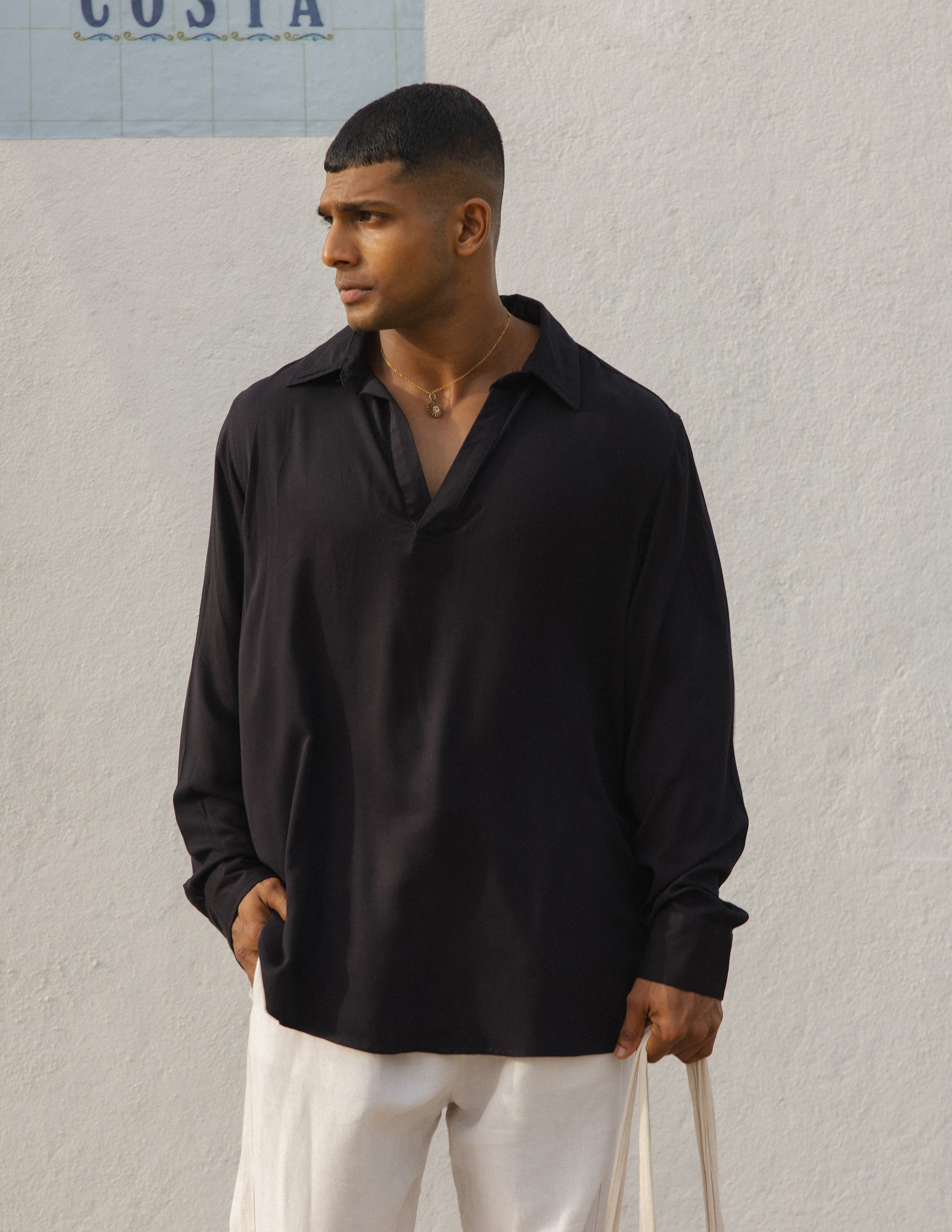 Half placket curved hem detail shirt