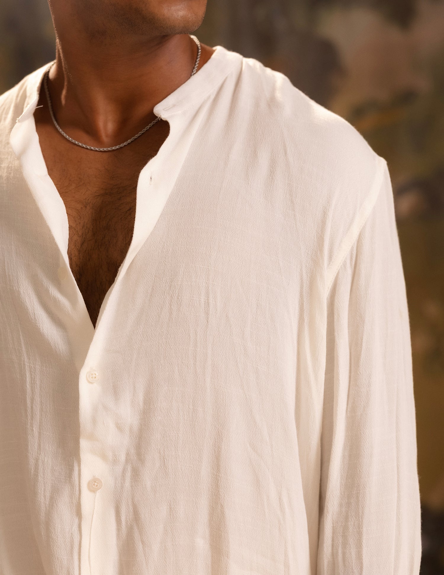 Oversized curved hem long sleeve shirt